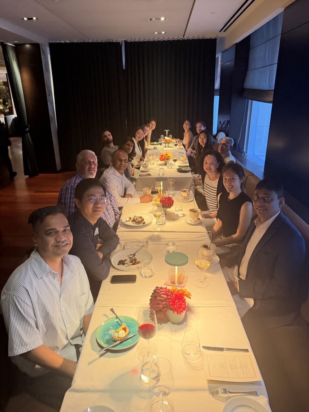 Oxus dinner at a long banquet table